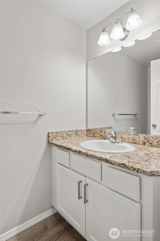 8077 165th Ln NE, Redmond, WA 98052 - bathroom featuring vanity and wood finished floors