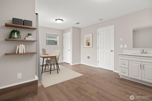 8077 165th Ln NE, Redmond, WA 98052 - dining space with wood finished floors and a desk