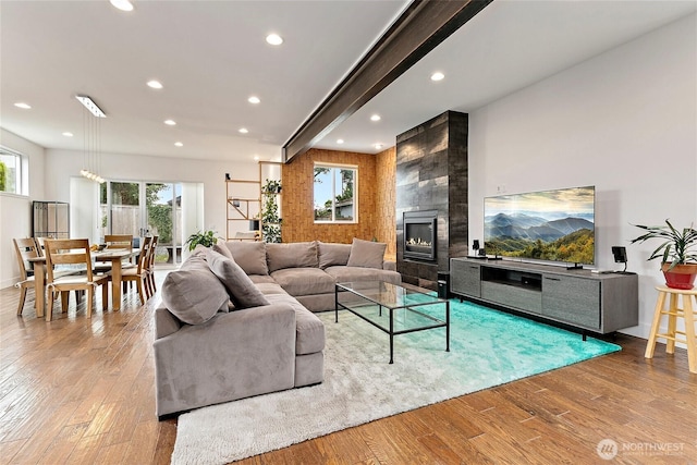4113 Palatine Ave N, Seattle, WA 98103 - living area with wood-type flooring, recessed lighting, and a fireplace