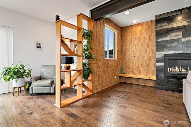 4113 Palatine Ave N, Seattle, WA 98103 - living area featuring wood-type flooring, a fireplace, and wooden walls