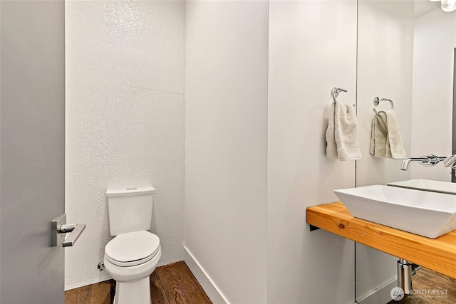 4113 Palatine Ave N, Seattle, WA 98103 - half bath with wood finished floors and toilet