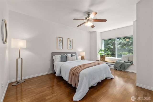 3112 SW Avalon Way Unit 102, Seattle, WA 98126 - bedroom featuring wood finished floors and a ceiling fan