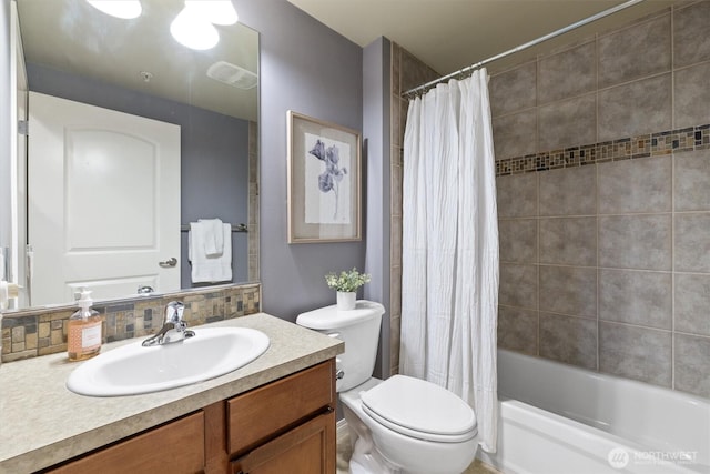 3112 SW Avalon Way Unit 102, Seattle, WA 98126 - bathroom with vanity, shower / tub combo with curtain, and tasteful backsplash