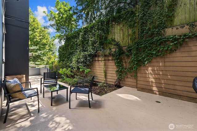 3112 SW Avalon Way Unit 102, Seattle, WA 98126 - fenced backyard featuring a patio area