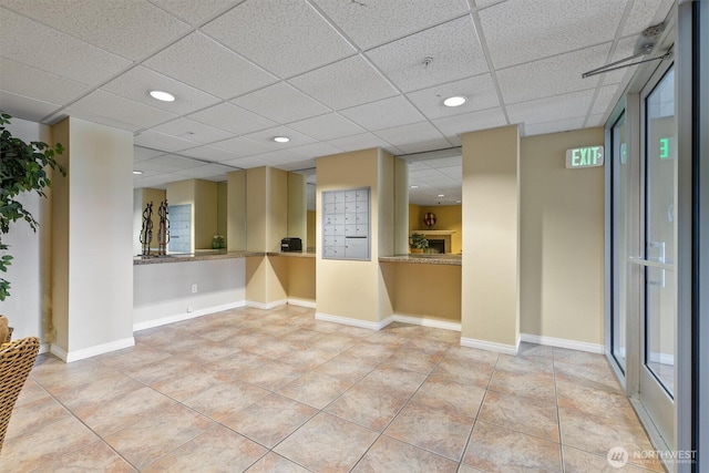3112 SW Avalon Way Unit 102, Seattle, WA 98126 - unfurnished room with light tile patterned floors, recessed lighting, and a drop ceiling