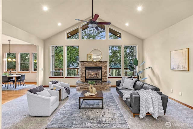 8 Southern Ct, Bellingham, WA 98229 - living room with a ceiling fan, a fireplace, recessed lighting, high vaulted ceiling, and wood finished floors