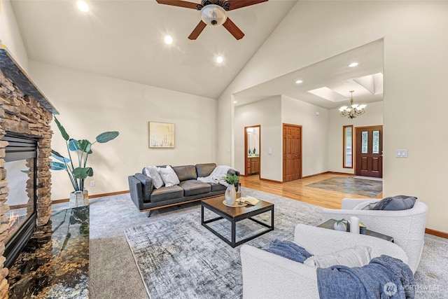 8 Southern Ct, Bellingham, WA 98229 - living area with a stone fireplace, recessed lighting, a ceiling fan, a chandelier, and high vaulted ceiling