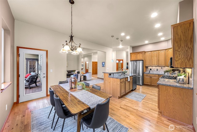8 Southern Ct, Bellingham, WA 98229 - dining space with light wood-style flooring, recessed lighting, and a chandelier