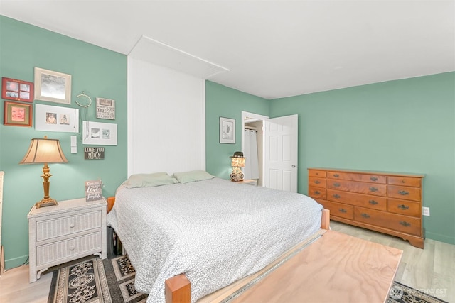 6070 Saxon Rd, Acme, WA 98220 - bedroom with light wood finished floors and attic access