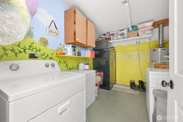 6070 Saxon Rd, Acme, WA 98220 - laundry room featuring washer and clothes dryer, cabinet space, and gas water heater