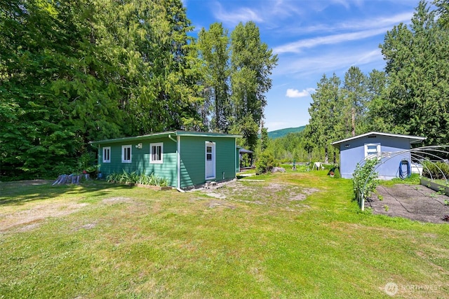 6070 Saxon Rd, Acme, WA 98220 - view of green lawn with an outdoor structure