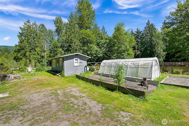 6070 Saxon Rd, Acme, WA 98220 - view of yard with an exterior structure, an outdoor structure, and a vegetable garden