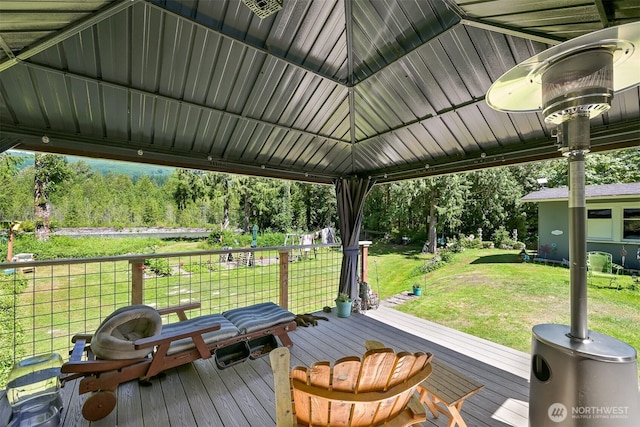 6070 Saxon Rd, Acme, WA 98220 - wooden terrace featuring a lawn, view of wooded area, and a gazebo