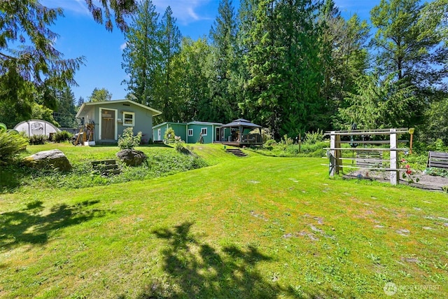6070 Saxon Rd, Acme, WA 98220 - view of green lawn featuring a gazebo and a storage unit