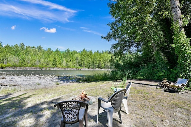 6070 Saxon Rd, Acme, WA 98220 - view of yard with a fire pit and a view of trees