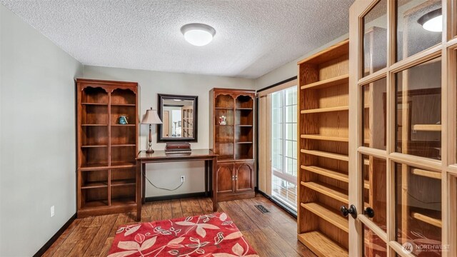 16621 148th Ave SE, Renton, WA 98058 - office with a textured ceiling and dark wood-type flooring