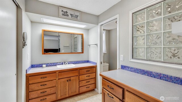 16621 148th Ave SE, Renton, WA 98058 - bathroom with vanity and toilet