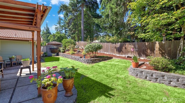 16621 148th Ave SE, Renton, WA 98058 - fenced backyard featuring a patio and a storage shed