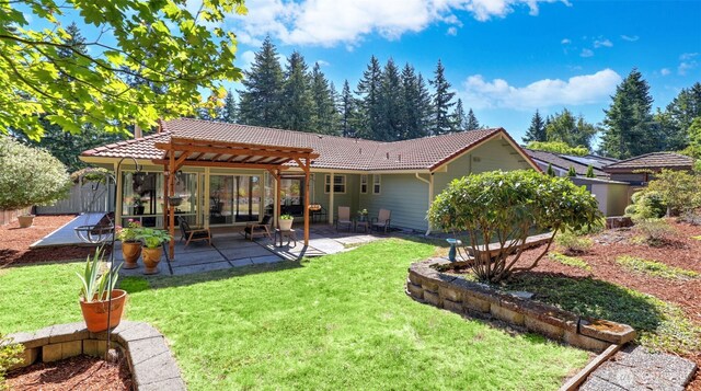 16621 148th Ave SE, Renton, WA 98058 - rear view of house featuring a tiled roof, a pergola, and a patio area