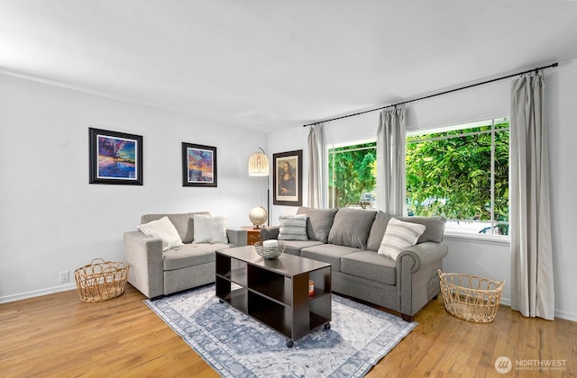 1528 NE 166th St, Shoreline, WA 98155 - living area featuring light wood-style flooring and baseboards
