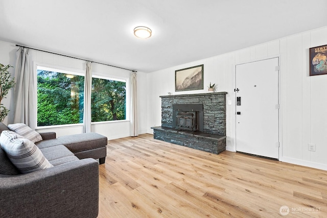 1528 NE 166th St, Shoreline, WA 98155 - living room featuring wood finished floors and a fireplace