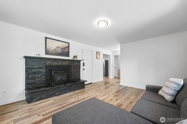 1528 NE 166th St, Shoreline, WA 98155 - living area featuring wood finished floors and a stone fireplace