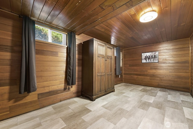 1528 NE 166th St, Shoreline, WA 98155 - hall with wooden ceiling, wood walls, and light wood-style flooring