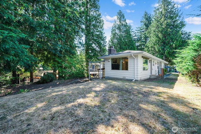 1528 NE 166th St, Shoreline, WA 98155 - view of side of home featuring a chimney