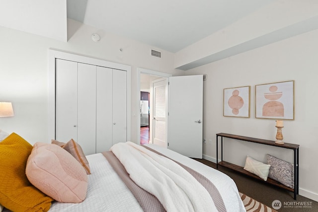 910 Lenora St Unit S403, Seattle, WA 98121 - bedroom with fridge with ice dispenser and a closet