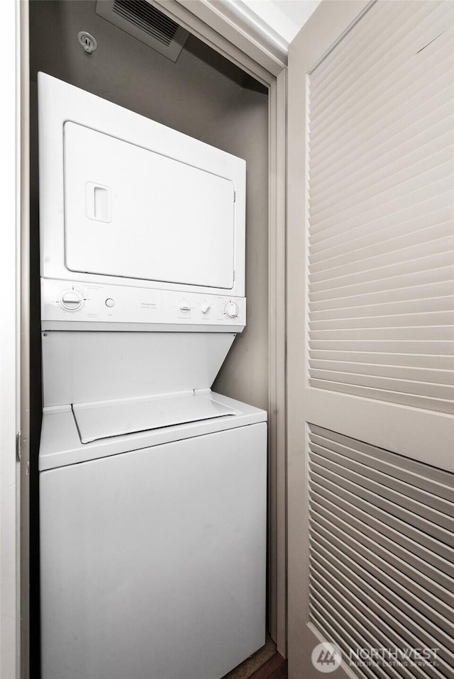 910 Lenora St Unit S403, Seattle, WA 98121 - laundry area with stacked washing machine and dryer