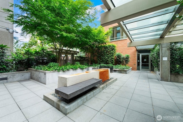 910 Lenora St Unit S403, Seattle, WA 98121 - view of patio / terrace with a pergola
