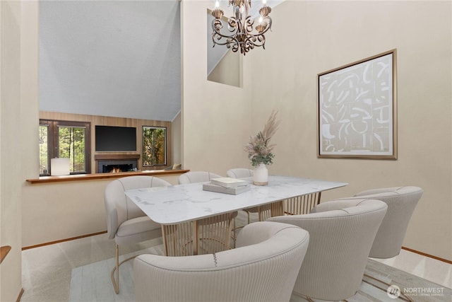 2514 174th Ave NE, Redmond, WA 98052 - dining area featuring a chandelier and vaulted ceiling