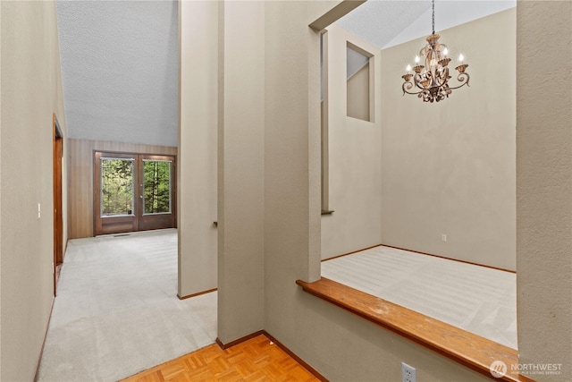 2514 174th Ave NE, Redmond, WA 98052 - corridor with a chandelier, lofted ceiling, a textured ceiling, and light carpet