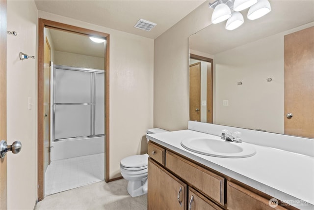 2514 174th Ave NE, Redmond, WA 98052 - bathroom featuring vanity and bath / shower combo with glass door