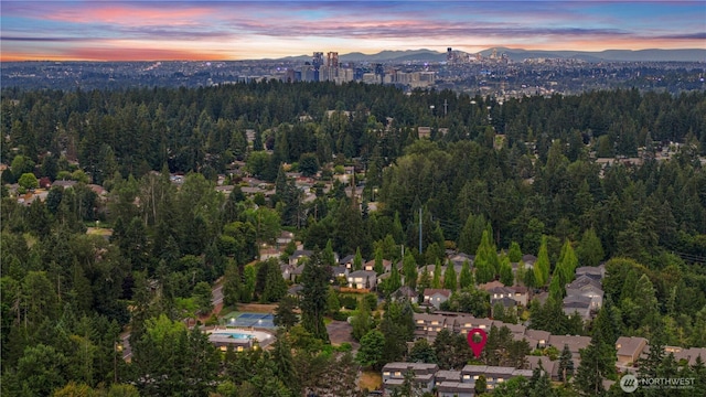 2514 174th Ave NE, Redmond, WA 98052 - aerial view of property and surrounding area featuring a forest and a mountainous background