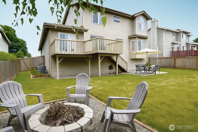 34801 30th Ave SW, Federal Way, WA 98023 - rear view of house featuring an outdoor fire pit, a fenced backyard, a deck, stairs, and a patio