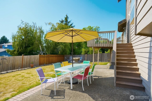 34801 30th Ave SW, Federal Way, WA 98023 - fenced backyard featuring stairway, outdoor dining space, a patio, and a deck