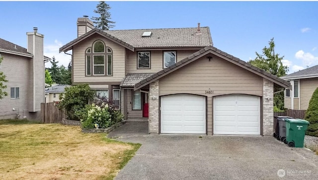 34801 30th Ave SW, Federal Way, WA 98023 - view of front facade with a tile roof, asphalt driveway, a chimney, and an attached garage