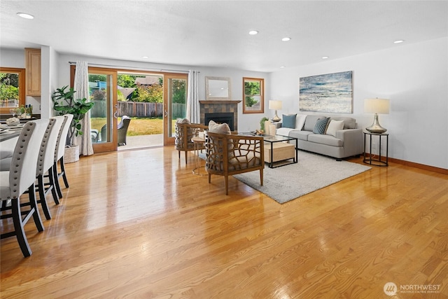 23303 13th Pl W, Bothell, WA 98021 - living room with healthy amount of natural light, recessed lighting, a tile fireplace, and light wood finished floors