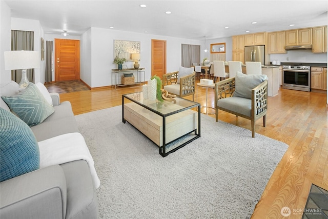 23303 13th Pl W, Bothell, WA 98021 - living area featuring light wood finished floors and recessed lighting