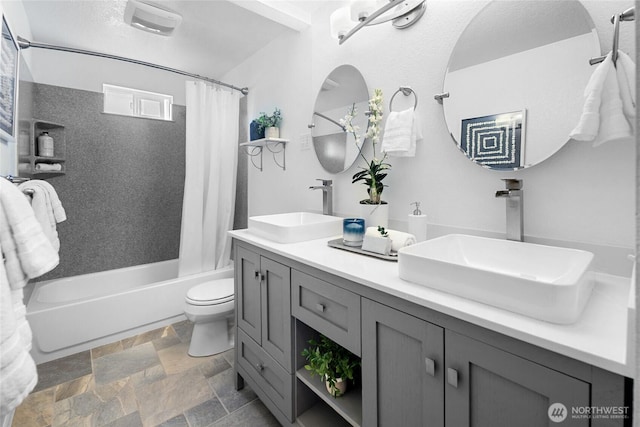 23303 13th Pl W, Bothell, WA 98021 - full bathroom featuring shower / bathtub combination with curtain, stone tile floors, and double vanity