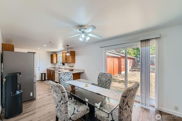 721 S 304th St, Federal Way, WA 98003 - dining room with light wood-type flooring, a ceiling fan, and recessed lighting