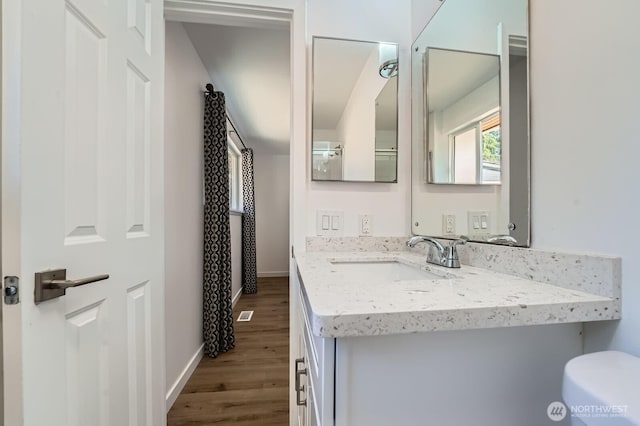 721 S 304th St, Federal Way, WA 98003 - bathroom with wood finished floors and vanity