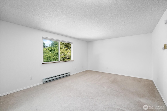 24814 SE 145th Ln, Kent, WA 98042 - empty room featuring a baseboard radiator, carpet floors, and a textured ceiling