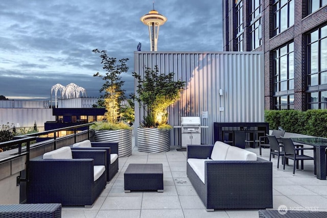 2911 2nd Ave Unit 1117, Seattle, WA 98121 - view of patio / terrace featuring an outdoor living space and grilling area