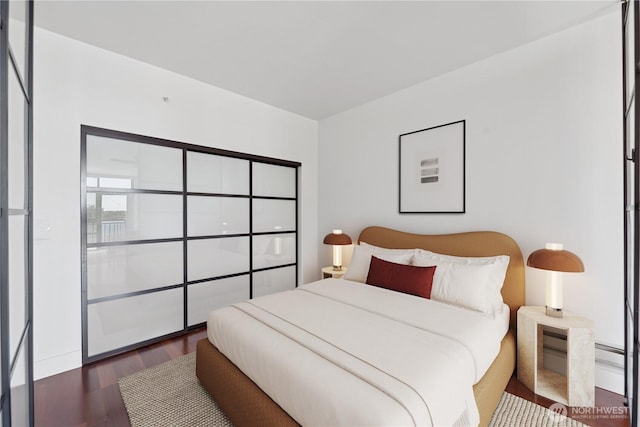 2911 2nd Ave Unit 1117, Seattle, WA 98121 - bedroom with wood finished floors