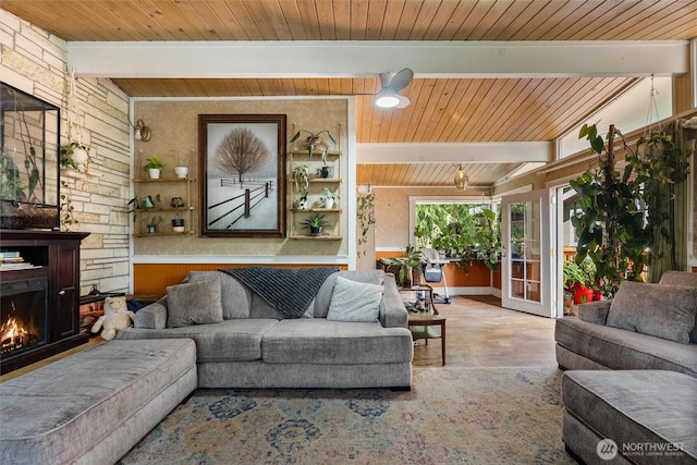 22616 88th Ave W, Edmonds, WA 98026 - living room with a wooden ceiling with exposed beams and a warm lit fireplace
