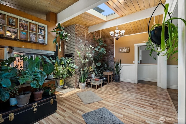 22616 88th Ave W, Edmonds, WA 98026 - sunroom / solarium featuring a skylight and a chandelier