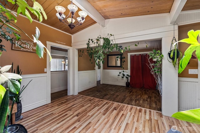 22616 88th Ave W, Edmonds, WA 98026 - foyer entrance featuring a chandelier, wood finished floors, wainscoting, and wood ceiling