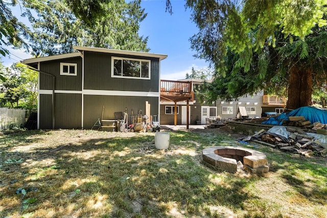 22616 88th Ave W, Edmonds, WA 98026 - rear view of property with an outdoor fire pit, a deck, and a yard
